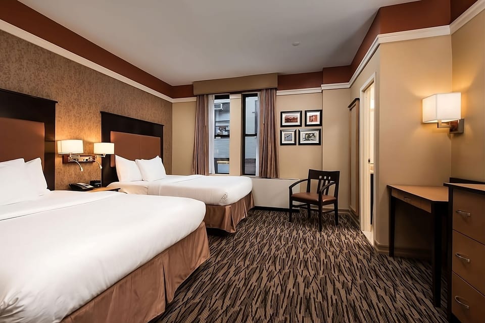 Imagine arriving to a spacious room with seating and soft tones.