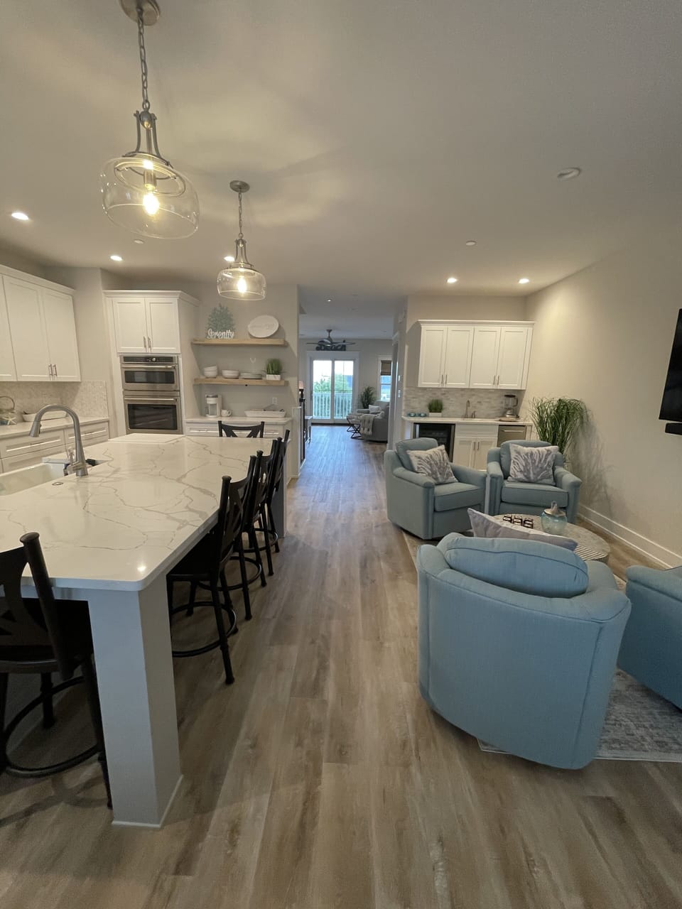 Kitchen and lounge area with open concept feel.