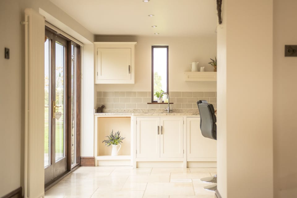 Ground floor: View of the kitchen from open-plan sitting and dining area