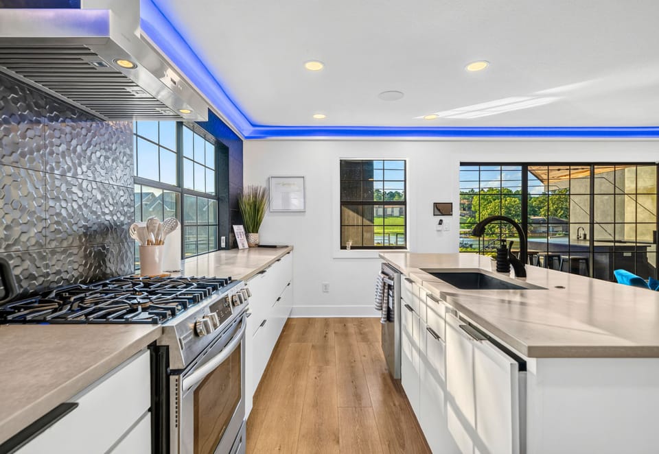Enjoy lake views while preparing your favorite meals in a kitchen that's as functional as it is beautiful.