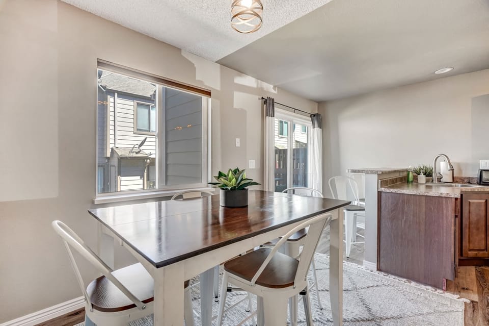 Open and inviting dining space with plenty of natural light, perfect for casual meals or gathering with friends.