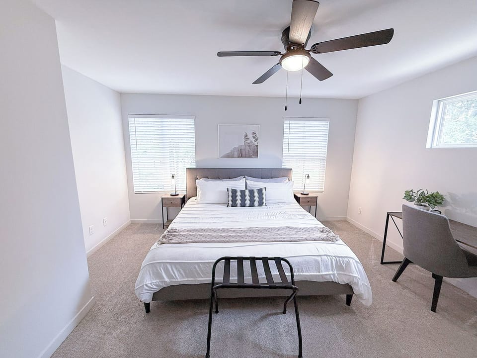 Discover the Cozy and Spacious Second Bedroom Upstairs with a King Bed. 