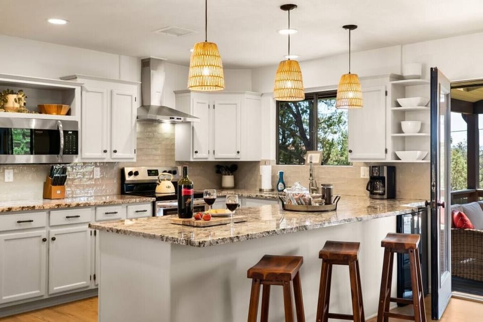 The kitchen is fully equipped with all the appliances and kitchenware to prepare delicious meals