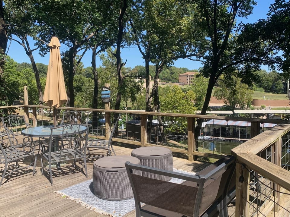 500 sq ft deck with plenty of seating.  Propane grill and flat top.