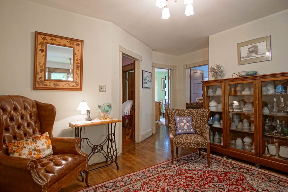 Setting area in the loft. This area overlooks the hall on the main level that leads to the half bath and the reading nook.
