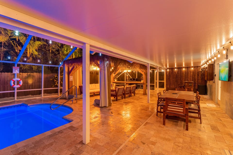 The outdoor dining area can serve 6-8 people and equip with a 55' smart TV.