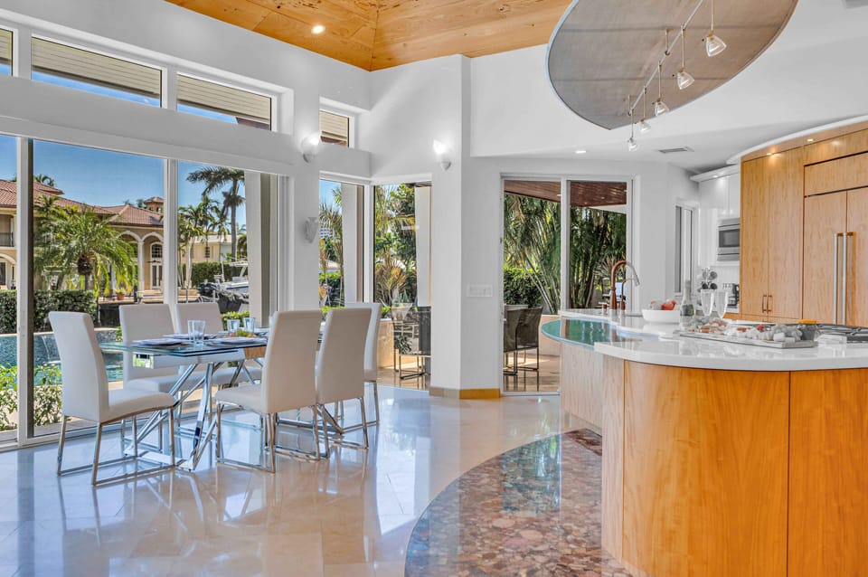 Breakfast nook overlooking the canal and heated pool.