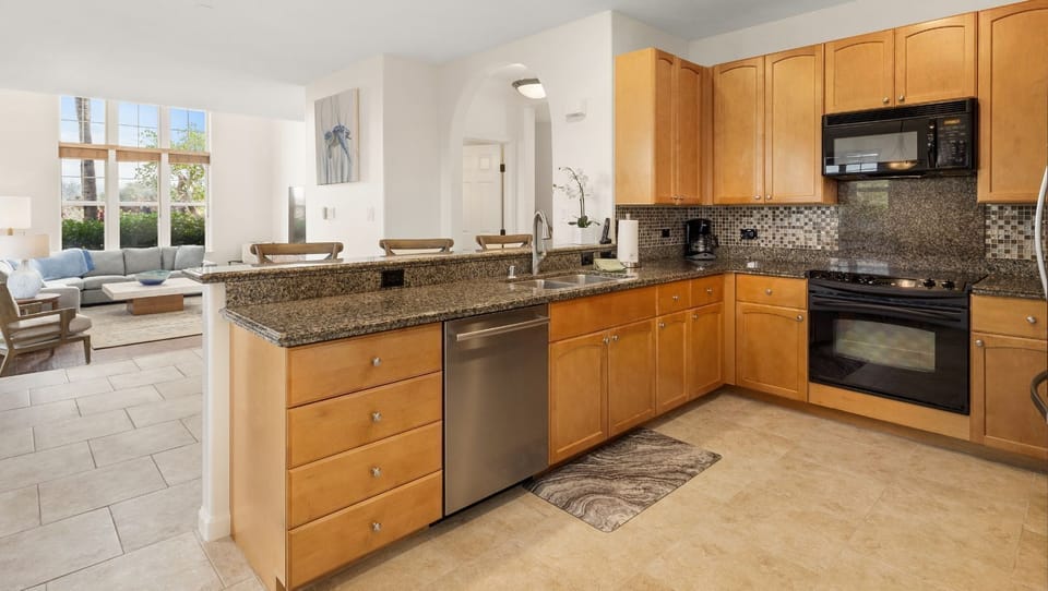 Well-equipped kitchen offers granite counter tops and everything you will need to prepare your meals when staying in
