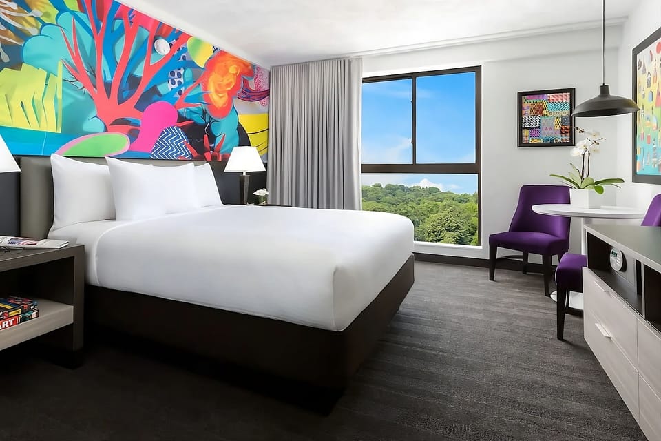 Wake up to treetop views and crisp, cloud-soft bedding.