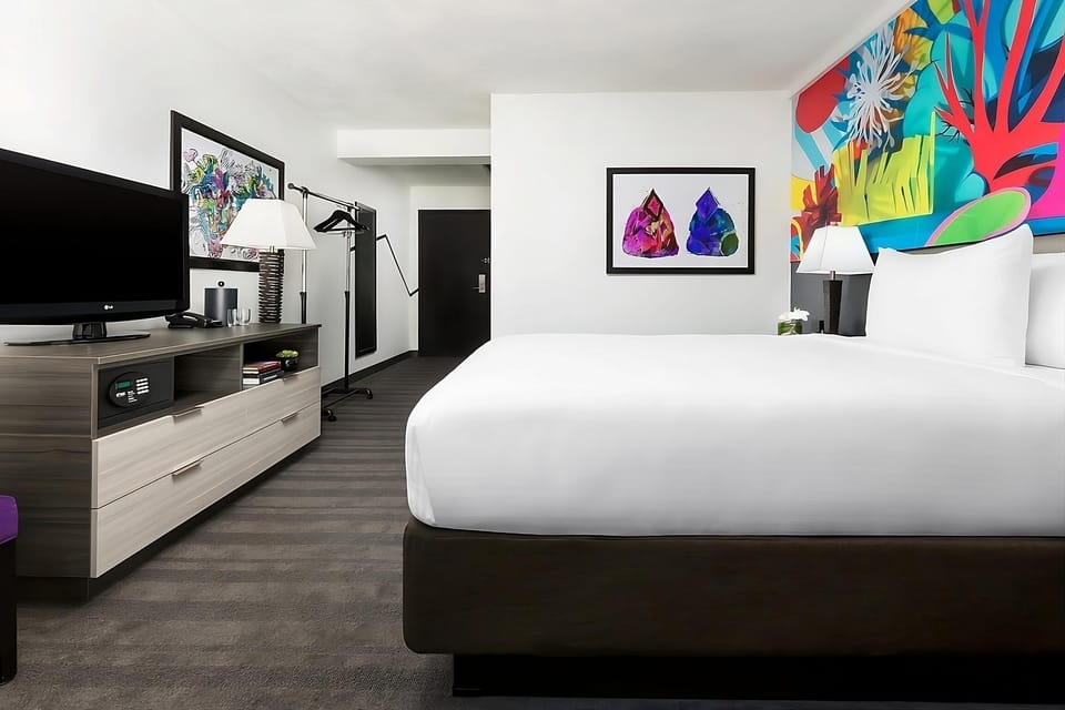 Settle in with spacious comfort, big-screen TV, and easy work setup.