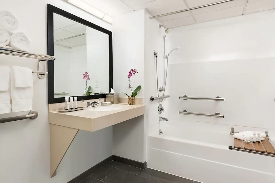 Refresh with a soothing soak in the bright, accessible tub.