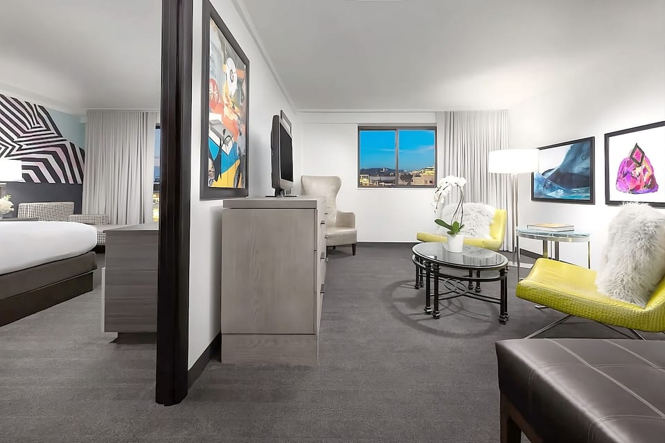 Lounge with friends in a stylish suite made for conversation.