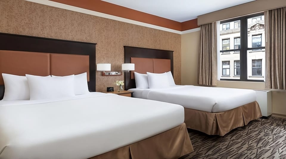 Stretch out on crisp linens in a comfortable double-queen room.