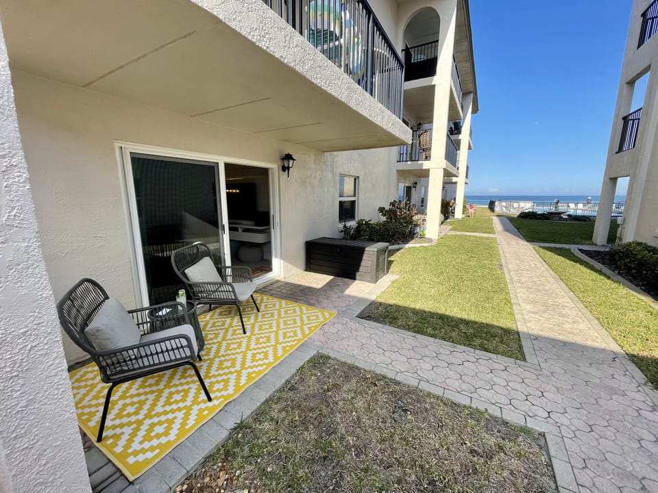 Patio with direct access to pool/beach