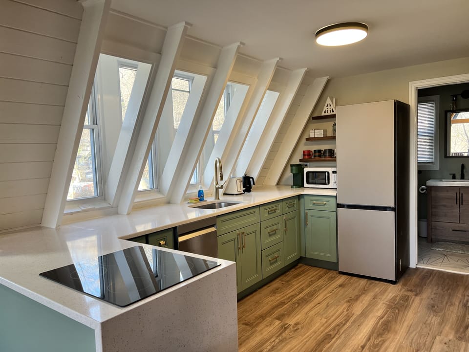 Modern cooking appliances and spacious countertop, the kitchen has it all!