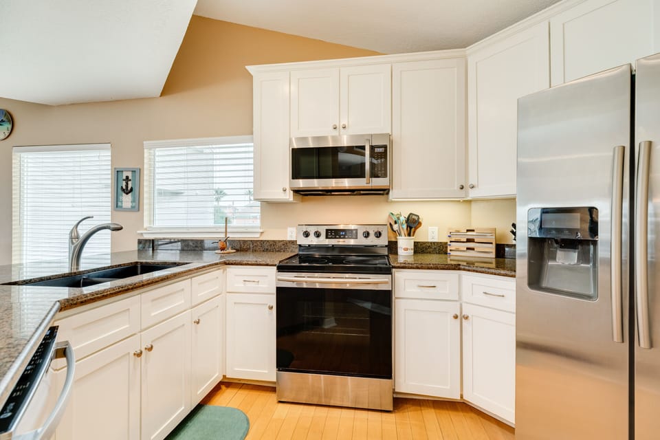 Fully equipped kitchen with stainless steel appliances