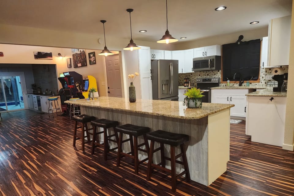 Full kitchen with stainless steel appliances is perfect for a dinner in and testing your cooking skills!