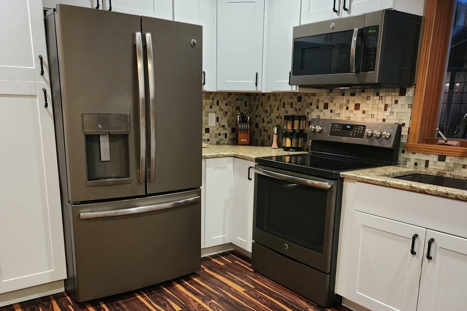 Full fridge, stove, oven and loaded with all the supplies for all your cooking needs!