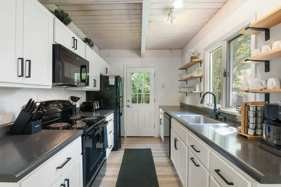 Prepare a meal in the galley kitchen, equipped with everything you’ll need.