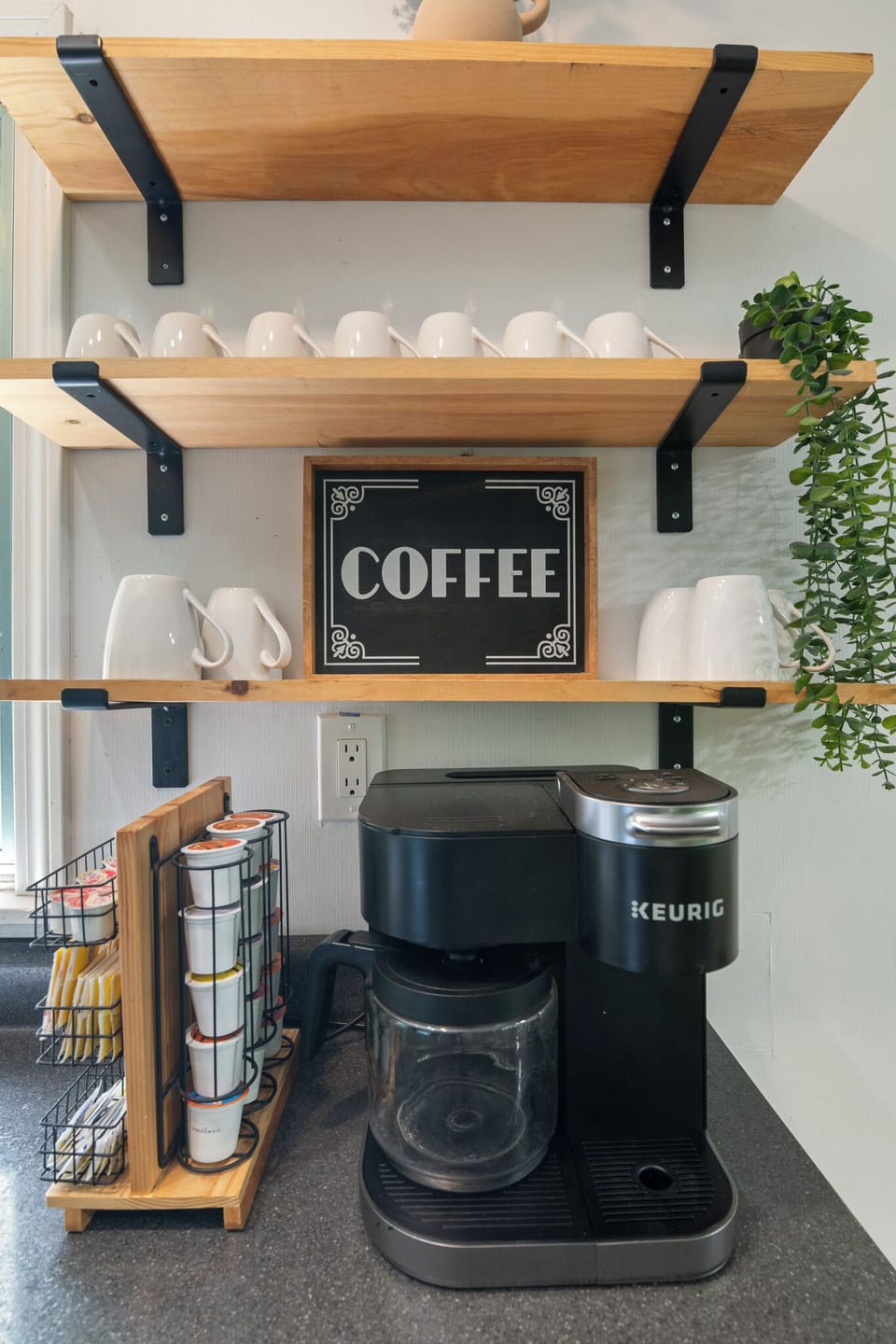 The Keurig Duo coffee maker that brews pods and carafe, fully stocked coffee bar