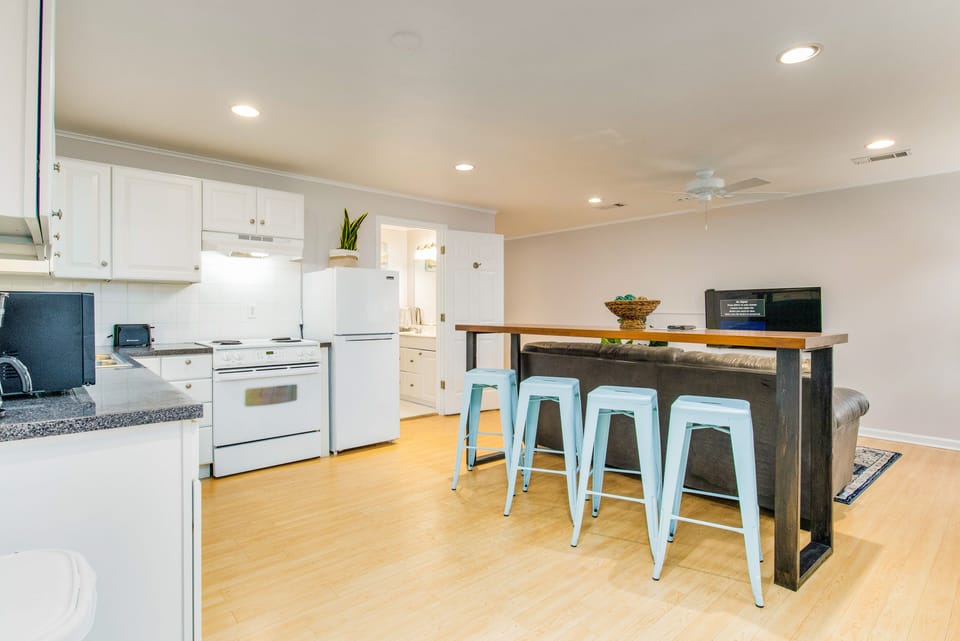 Open kitchen to stay connected to the living room.