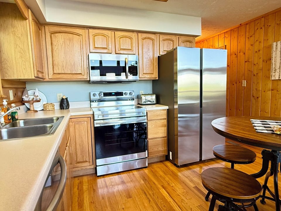 Fully stock kitchen with brand new stainless steel appliances. 