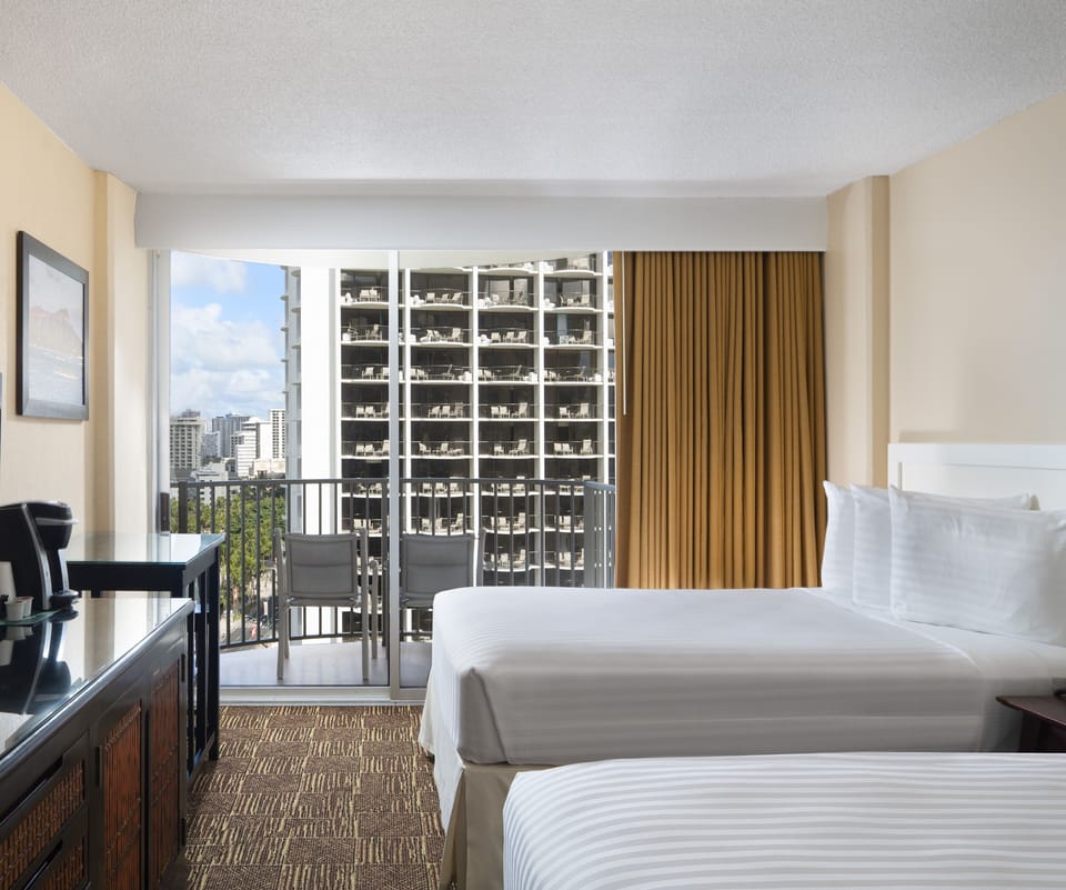 Settle in with in-room entertainment and an easy work nook.