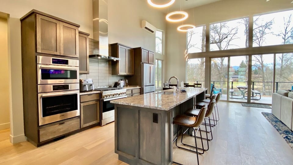 Kitchen and Island Area with 4 chairs