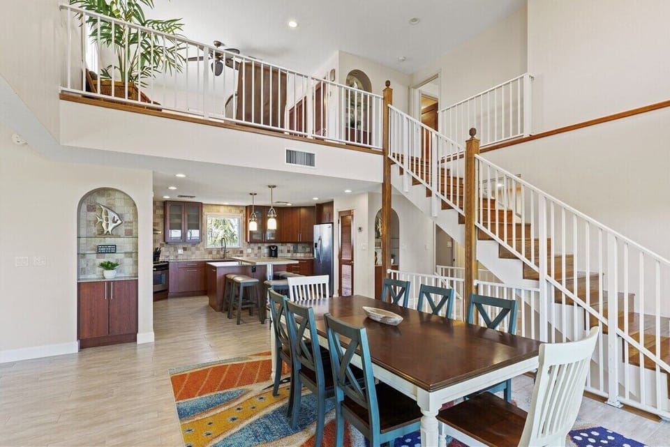 Open sightlines and dramatic ceilings create a welcoming gathering place.
