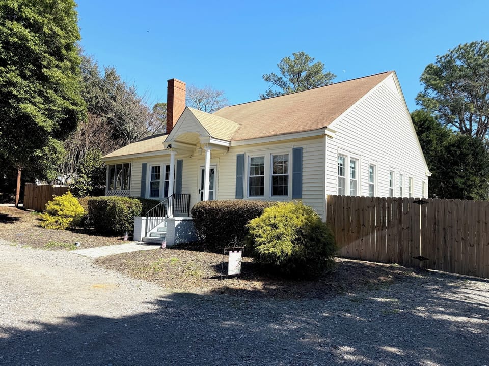 Green Acres, circular driveway, fenced in backyard