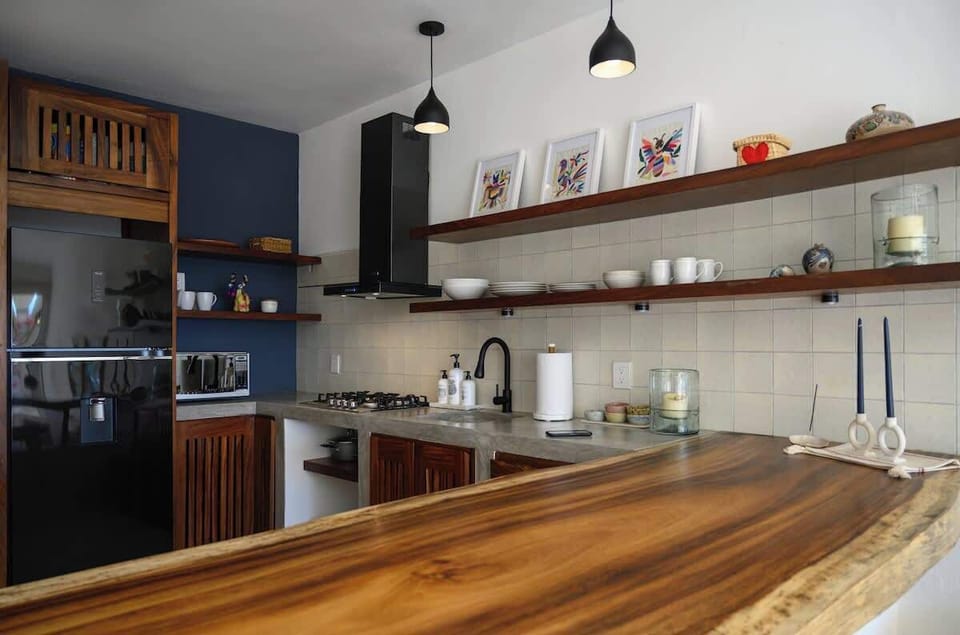 Fully equipped kitchen with modern appliances
