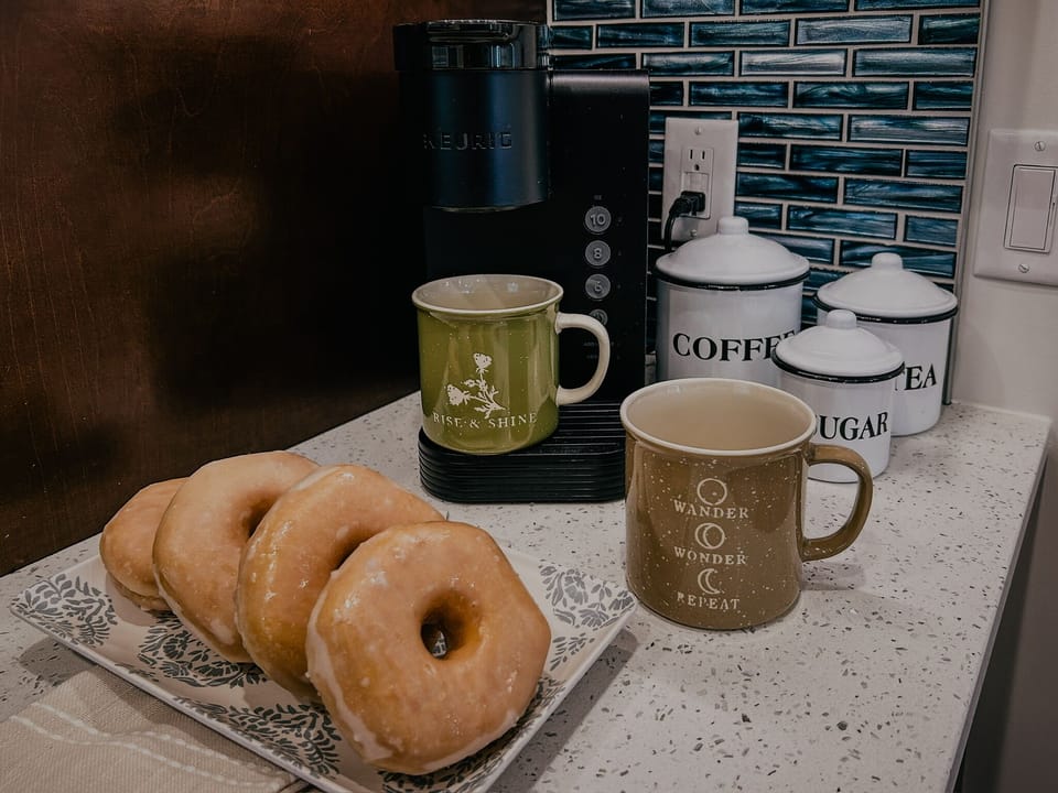 Keurig and starter supply of K-cups.  Drip coffee maker also available.