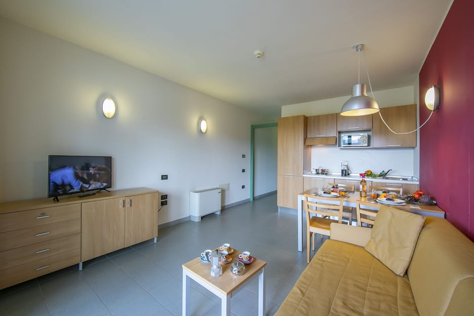 living room with kitchen and dining table view