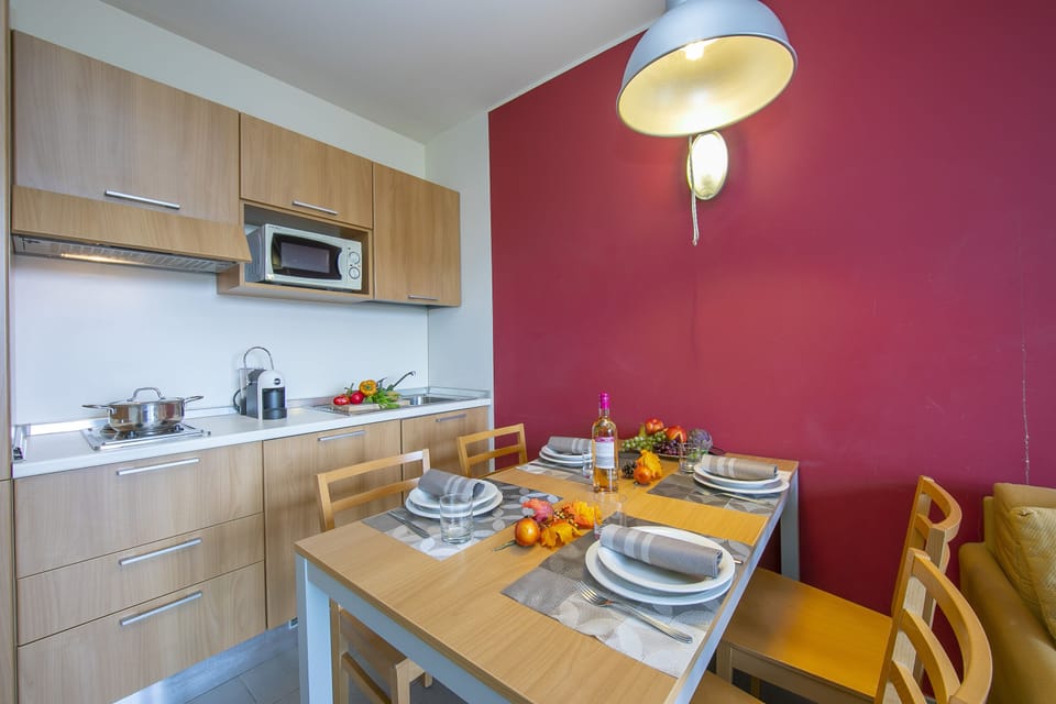 view on dining table and kitchen