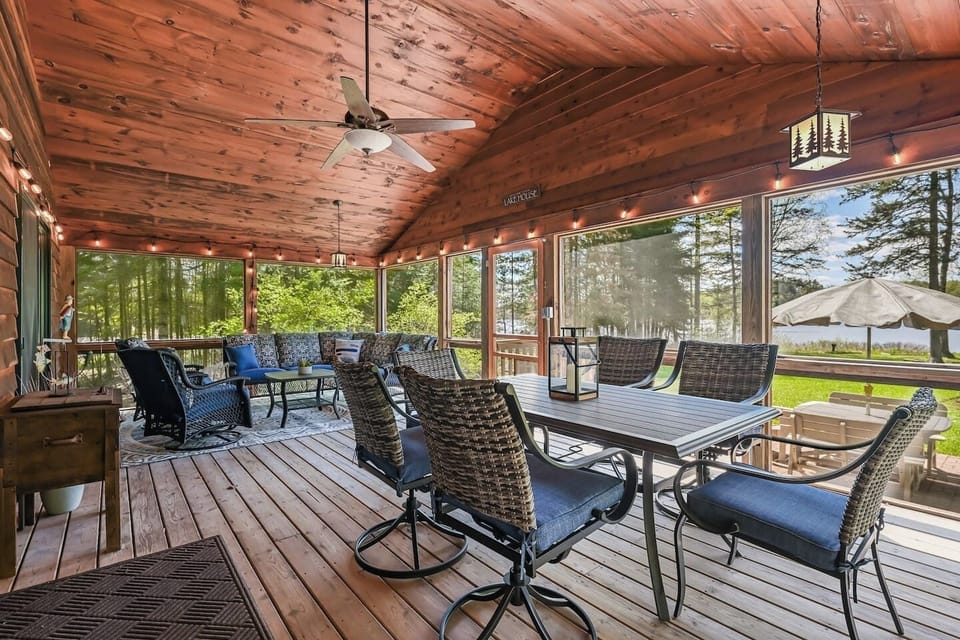 Enjoy the breeze and lake views sitting on the spacious screened in porch