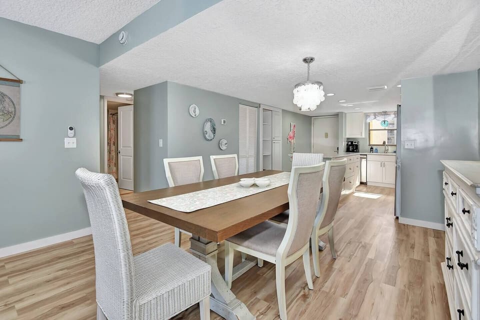 Dining room and hall leading to second bath and guest bedroom 