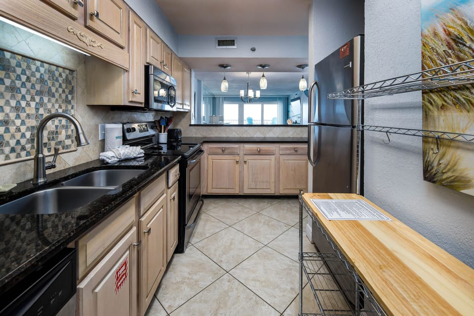 Updated kitchen - FULLY STOCKED! - Everything you need to prepare that memorable meal is right here for you.