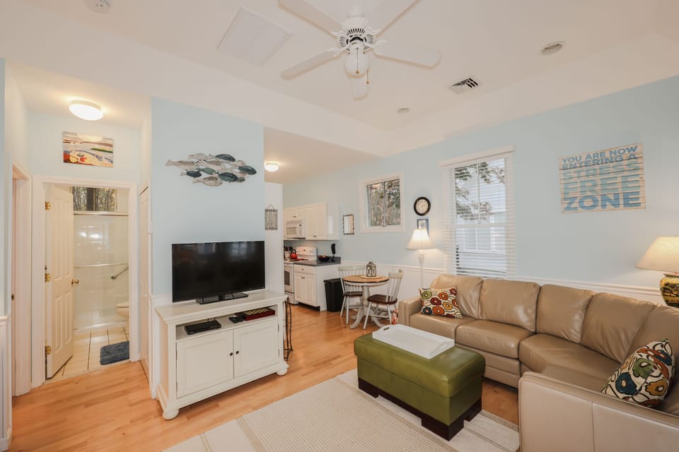 Flat screen TV in living room with cable tv and Disney +