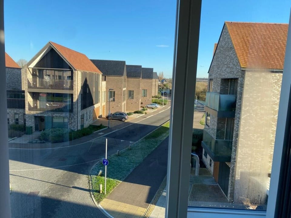 Lounge with big windows overlooking the development
