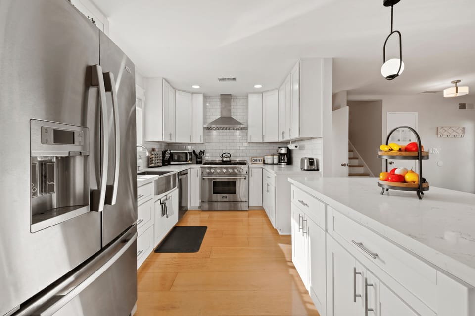 This stunning designer kitchen has everything you need—and then some.
