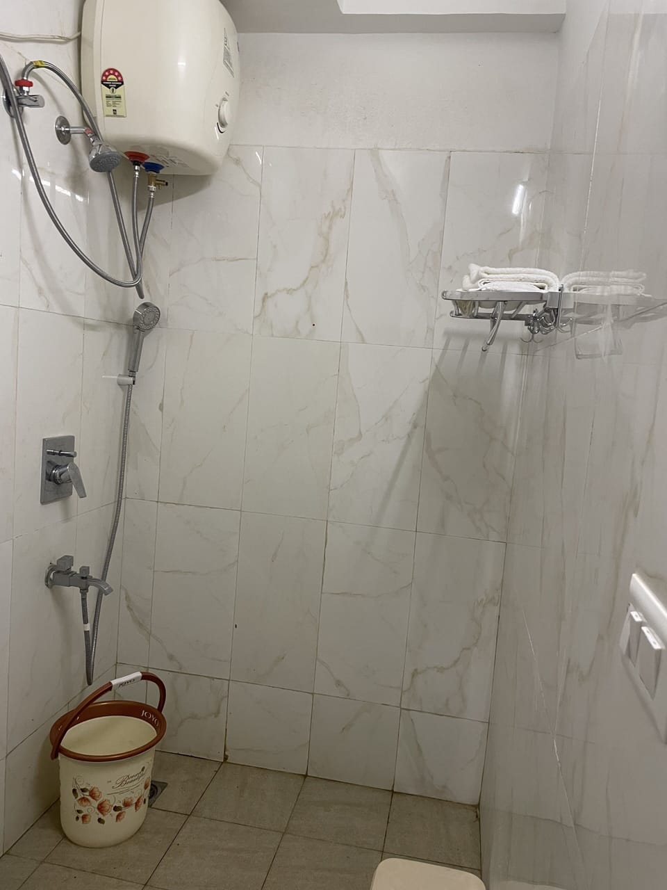 Toilet, shower, bidet