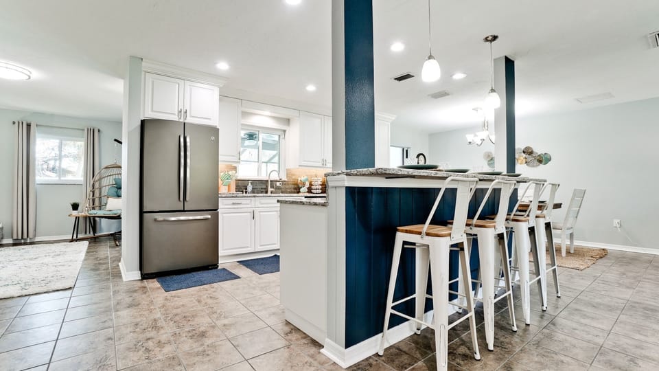 Open-concept kitchen/living room—ideal for socializing in style.
