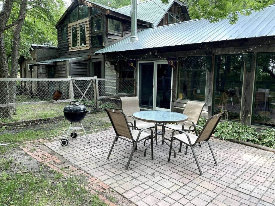 Relax on the patio as you tend the meat on the grill. 