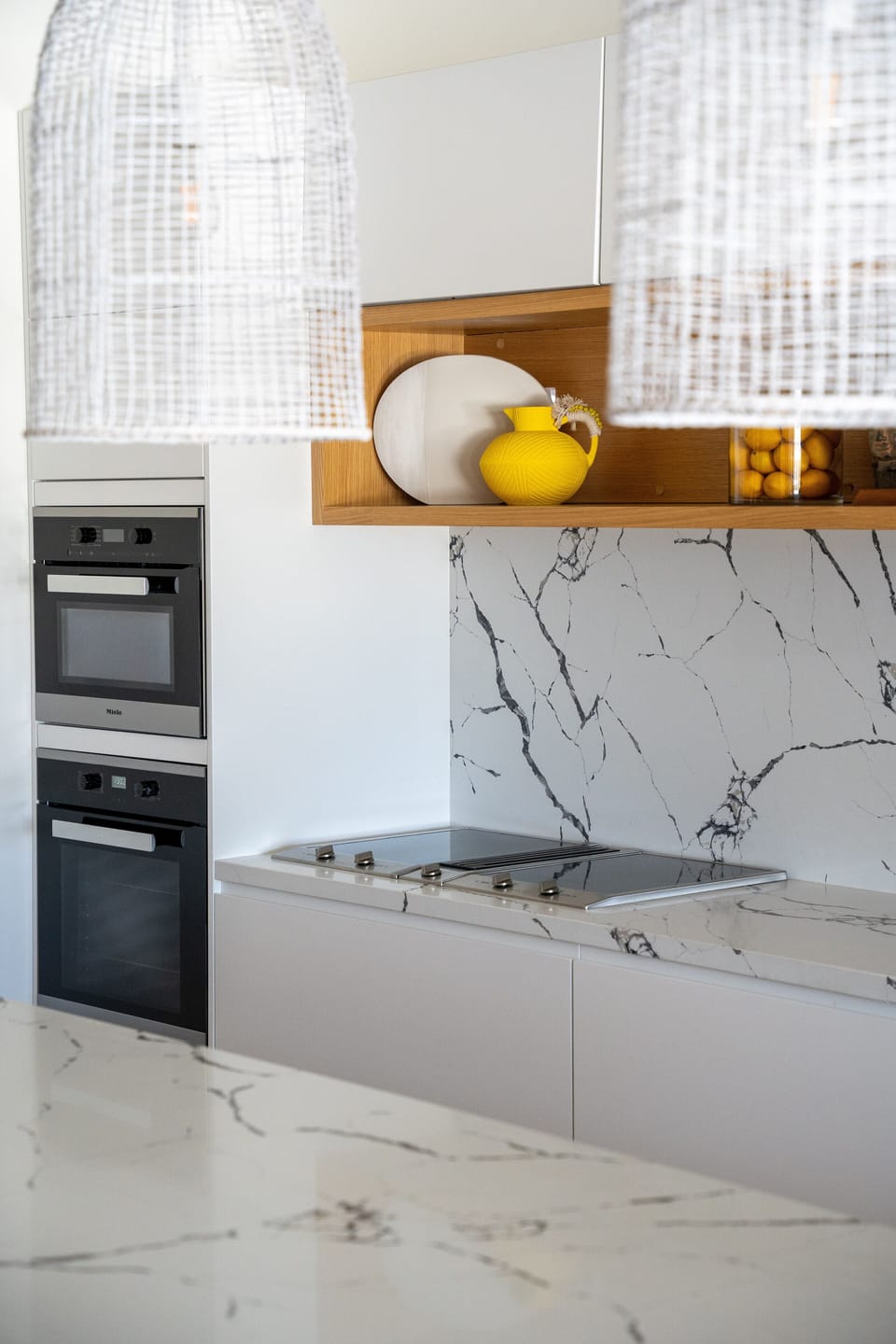 Gourmet kitchen with multiple ovens. All. Miele appliances
