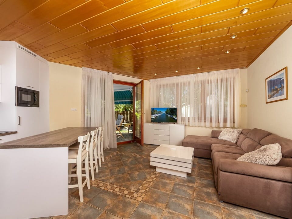 Furniture, Couch, Picture Frame, Wood, Interior Design, Flooring, Comfort, Floor, Living Room, Hall