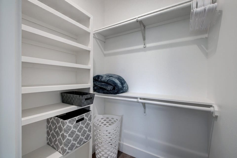 This Cabinet is equipped with a hanger for your clothes and other belongings.