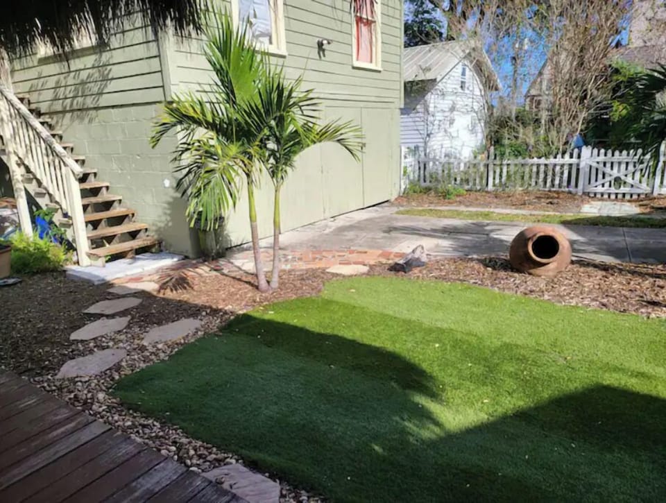 Back yard.  Garage apartment ( daughter lives there).