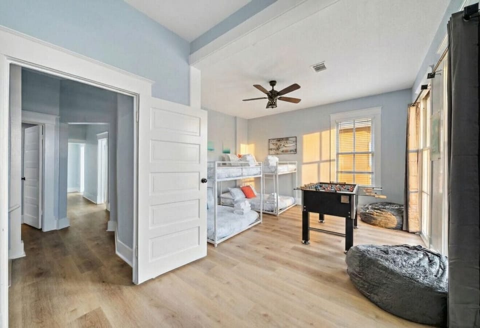 This bedroom has 2 double bunk beds