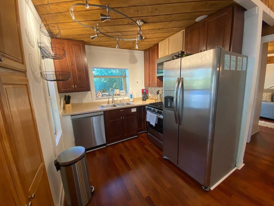 The kitchen is fully stocked with cookware and the all essentials.