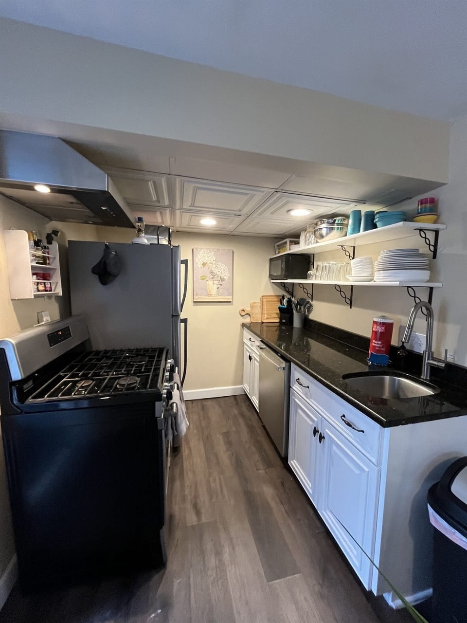 Fully stocked kitchen with dinnerware, cookware, salt, pepper, oil and all of the essentials.